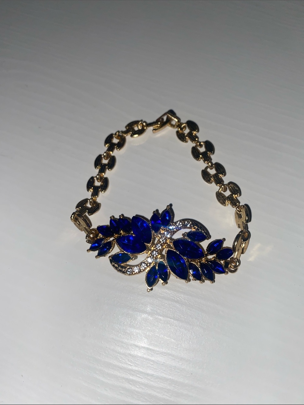 Girls Gold-Tone Bracelet with Deep Blue Crystal Flower Design